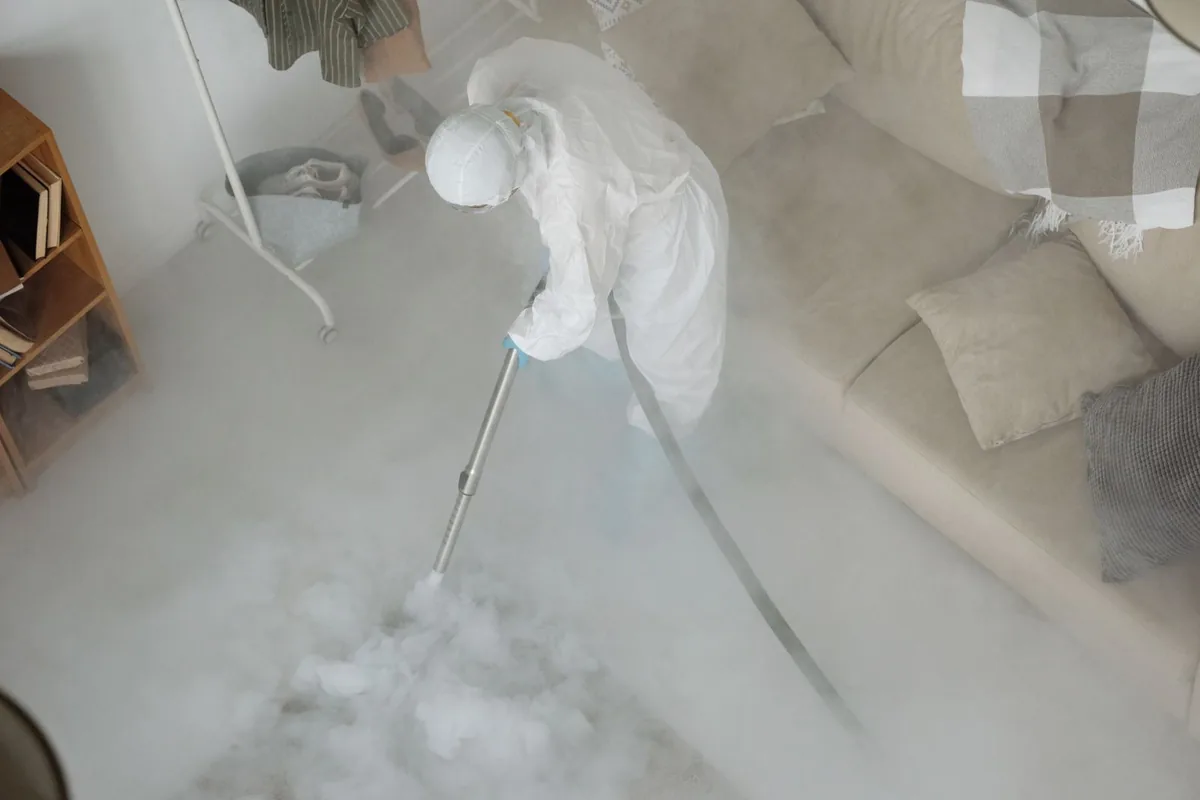 Biohazard cleanup technician in protective equipment, Frederickson, WA